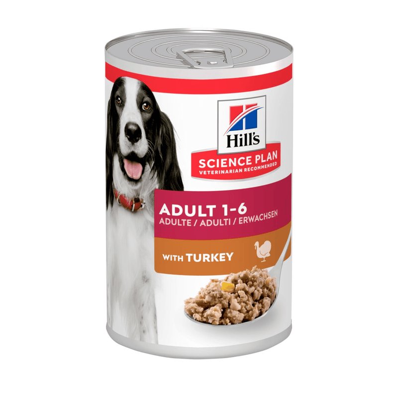 Hills Science Plan dog tin with a black and white spaniel-type dog on the label, text reads 'Adult 1-6' and a picture of a Turkey with text 'with Turkey' on a white background. 