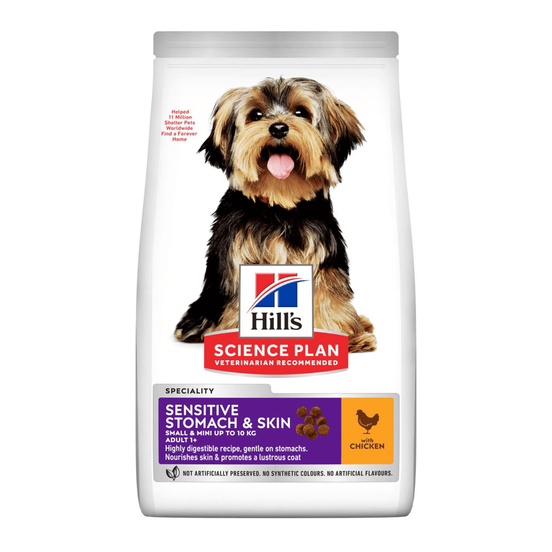 Hills Science Plan dry dog food packaged in a white bag with a small adult Yorkshire terrier dog pictured on the bag. Text on bag say 'Hill's Science Plan, veterinarian recommended' and 'Sensitive stomach & Skin, Adult 1+' with a chicken pictured with text 'with chicken' beneath on white background. 