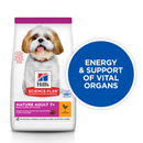 Hills Science Plan dry dog food packaged in a white bag with a small adult brown and white dog pictured on the bag. Text on bag say 'Hill's Science Plan, veterinarian recommended' and 'Mature Adult 7+' with a chicken pictured with text 'with chicken' beneath on white background. Large blue circle pictured over the side of the bag with white text saying 'Energy & Support of vital organs'. 