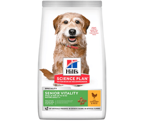 Hills Science Plan dry dog food packaged in a white bag with an small adult brown dog pictured on the bag. Text on bag says 'Hill's Science Plan' and 'Senior Vitality, Small & Mini up to 10kg, Mature Adult 7+' with a chicken pictured with text 'with Chicken & rice' beneath on white background. 