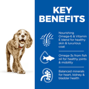 Picture of a small senior brown dog pictured next to a blue section with white text stating 'Key Benefits, Nourishing omega-6 & vitamin E blend for healthy skin & luxurious coat, Omega-3s from fish oil for healthy joints & mobility, Balanced minerals for heart, kidney & bladder health'. 