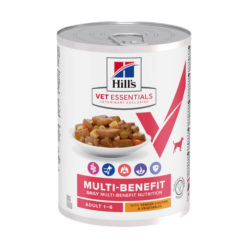 Hills Vet Essentials dog tin with a bowl of food pictured on the label, text reads 'Multi-Benefit, Adult 1-6' and 'Tender Chicken & added Vegetables' on a white background. 