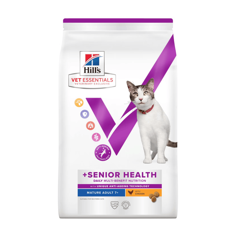 Hills Vet Essentials dry cat food packaged in a white bag with an adult tabby and white cat pictured on the bag. Text on bag says 'Hill's Vet Essentials, veterinary exclusive' and '+Senior Health, Mature Adult, 7+ years' with a chicken pictured with text 'with Chicken' beneath on white background. 