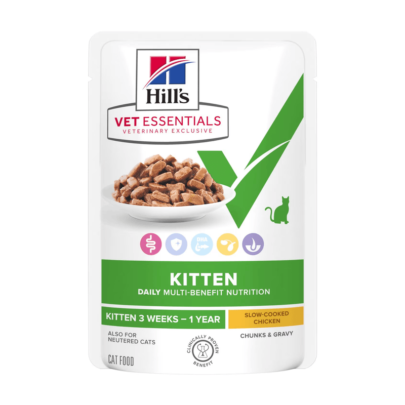 Hills Vet Essentials wet cat food packaged in a white pouch with a picture of the food on the bag. Text on bag says 'Hill's Vet Essentials, veterinary exclusive' and 'Kitten, 3 weeks - 1 year' with text 'Slow-Cooked Chicken' beneath on white background. 