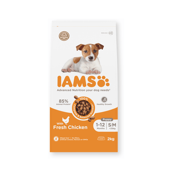A 2kg bag of IAMS Fresh Chicken puppy food for 1-12 months old small breed dogs, featuring a white and orange package with a picture of a Jack Russell Terrier puppy.