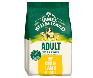 White background with a bag of James Wellbeloved Lamb & Rice Dog Food. Packaging is green and cream with 3 dogs pictured, with text 'Adult, Dog 1-7years, Lamb and Rice'. 