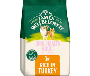 White background with a bag of James Wellbeloved Oral Health Turkey Cat Food. Packaging is green and cream with 2 cats pictured, with text 'Oral Health Adult, 1-7years, Rich in Turkey'. 