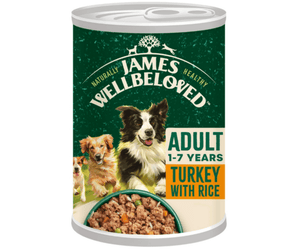 White background with a tin of James Wellbeloved Adult Dog Turkey flavoured wet food. The tin is green and cream with 3 puppies pictured, with text 'Adult 1-7 years, Turkey with Rice'. 