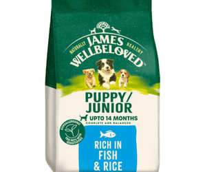 White background with a bag of James Wellbeloved Fish & Rice Puppy/Junior Food. Packaging is green and cream with 3 puppies pictured, with text 'Puppy/Junior ,Upto 14 months, Rich in Fish & Rice'. 