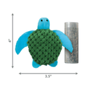 Blue turtle cat toy with a green waffle fabric shell, pictured next to a tube of catnip. Pictured on a white background with measurements to the left 4" and underneath 3.5". 