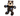 White background with a KONG dark brown plush teddy bear dog toy with blue patchwork patches. 