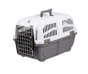 White background with a Krusse Skudo size 2 Travel Crate. The crate is light and dark grey plastic with a closed metal door.