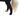 Close up of the hind legs of an adult brown and white Collie type dog wearing a black bodysuit. Picture shows one paw covered, and one not. 