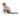 White background with an young adult tabby and white cat wearing a beige bodysuit while sitting pictured.