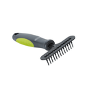 White background with a small black BUSTER Undercoat Rake Brush with fixed pins and green grips laying on the pins.