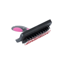 White background with a medium black plastic brush with pink grip handle and plastic bristles with red tips pictured. 