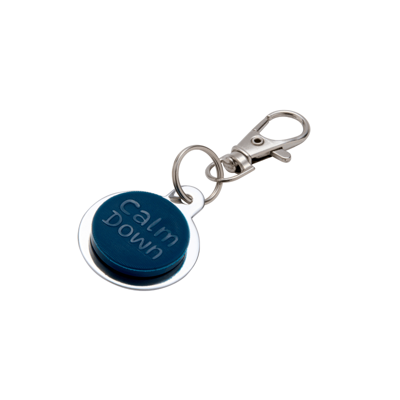 Keychain with a blue button that says 'Calm Down' on a white background