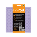 White background with a Lavender LickiMat Buddy slow feeder mat with a criss-cross surface. The Playdate mat is in black and orange packaging cardboard packaging. 