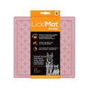 White background with a Guava LickiMat Buddy slow feeder mat with a criss-cross surface. The Playdate mat is in black and orange packaging cardboard packaging. 