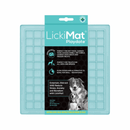 White background with a mint LickiMat Playdate slow feeder mat with a square grid surface. The Playdate mat is in black and blue packaging cardboard packaging. 