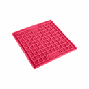 White background with a pink LickiMat Playdate slow feeder mat with a square grid surface. 