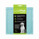 White background with a mint coloured LickiMat Soother slow feeder mat with a bobbly surface. The Soother mat is in black and green packaging cardboard packaging. 