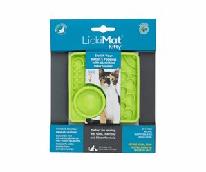 White background with a green square LickiMat Kitty slow feeder mat with a scaly and bobbly surface. The Kitty mat is in blue and white cardboard packaging with a kitten pictured on the packet. 