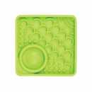 White background with a green square LickiMat Kitty slow feeder mat with a scaly and bobbly surface. 
