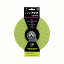 White background with a green LickiMat Splash slow feeder with a criss-cross internal surface. The Splash bowl is in black cardboard packaging. 