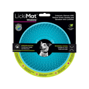 White background with a turquoise LickiMat Wobble slow feeder with a bobbly internal surface. The Wobble bowl is in black cardboard packaging. 