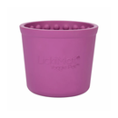 White background with a green LickiMat Yoggie Pot feeder with a bobbly internal surface. 