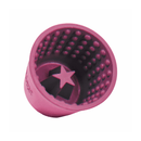 White background with a purple LickiMat Yoggie Pot feeder with a bobbly internal surface and a star shape at the bottom. 