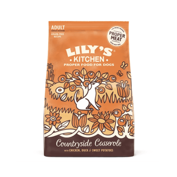 A bag of Lily's Kitchen 'Countryside Casserole' dog food, featuring an orange and brown design with a white dog illustration and floral patterns.