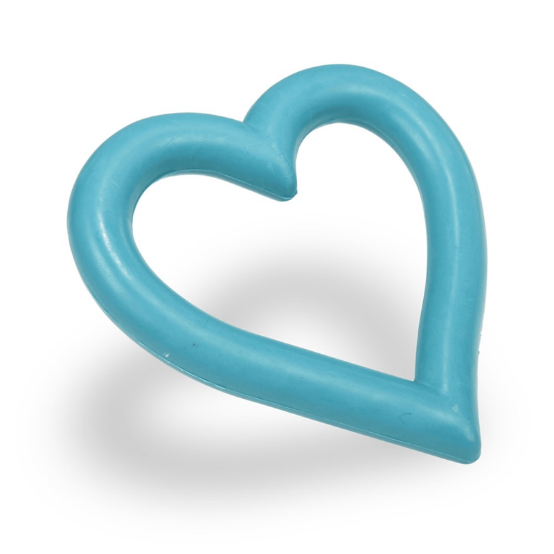 Tilted blue heart shaped rubber dog toy on a white background. 