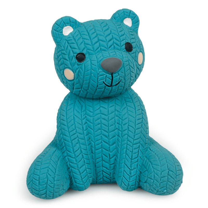 Front facing blue latex teddy bear in a sitting position on a white background. 