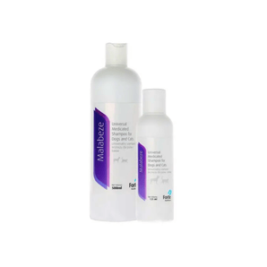 Two bottles of Malabeze shampoo on a white background