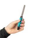 White background with a hand holding a Mikki Claw File, the blue handle has black pawprints on it and a stainless steel file. 