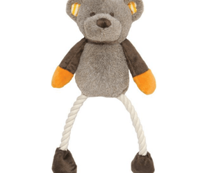 Teddy bear toy dog with brown head and body with orange ears and hands, white rope legs attached to brown feet pictured on a white background. 