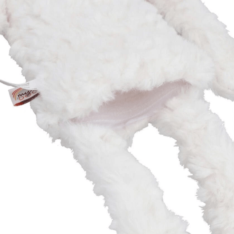 White bear shaped dog toy with long arms and legs, close up detail of opened pouch with Velcro on a white background 