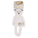 White bear shaped dog toy with long arms and legs, stitched detail eyes, brown nose with tags attached to top and mid-section. Pictured on a white background. 
