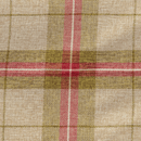 Close up of plaid green, red and cream fabric dog bed. 