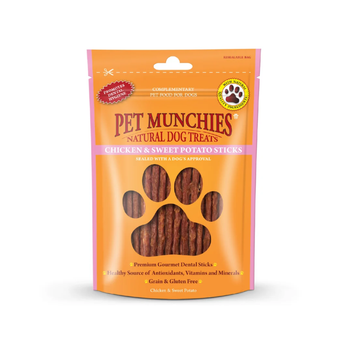A package of Pet Munchies Natural Dog Treats, Chicken and Sweet Potato Sticks, in an orange stand-up pouch with a pink side border and a clear window showing the brown sticks inside.