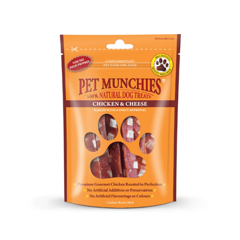 A stand-up pouch of Pet Munchies Chicken with Cheese dog treats on a plain white background. The packaging is bright orange with a large paw-shaped window showing the chicken with cheese treats inside.