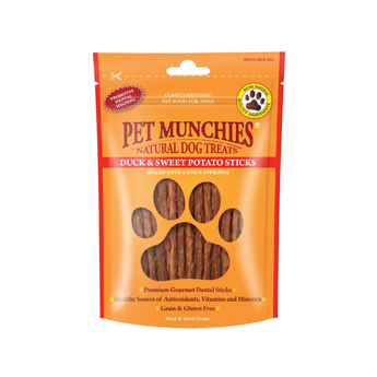 A package of Pet Munchies Natural Dog Treats Duck & Sweet Potato Sticks, in an orange resealable stand-up pouch with a paw print window showing the brown stick treats inside.
