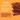 Pet Munchies natural pet treat with text explaining the features on an orange background.
