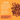 Promotional graphic for Pet Munchies Natural Pet Treats showing cubical duck treat pieces on a bright orange background with product text promoting the features of the treats. 