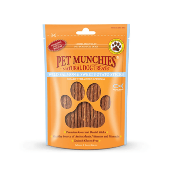 A package of Pet Munchies Natural Dog Treats Salmon & Sweet Potato Sticks, in an orange resealable stand-up pouch with a paw print window showing the brown stick treats inside.