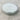Round silver keepsake box with 'Cherished Keepsake' text on a light gray surface