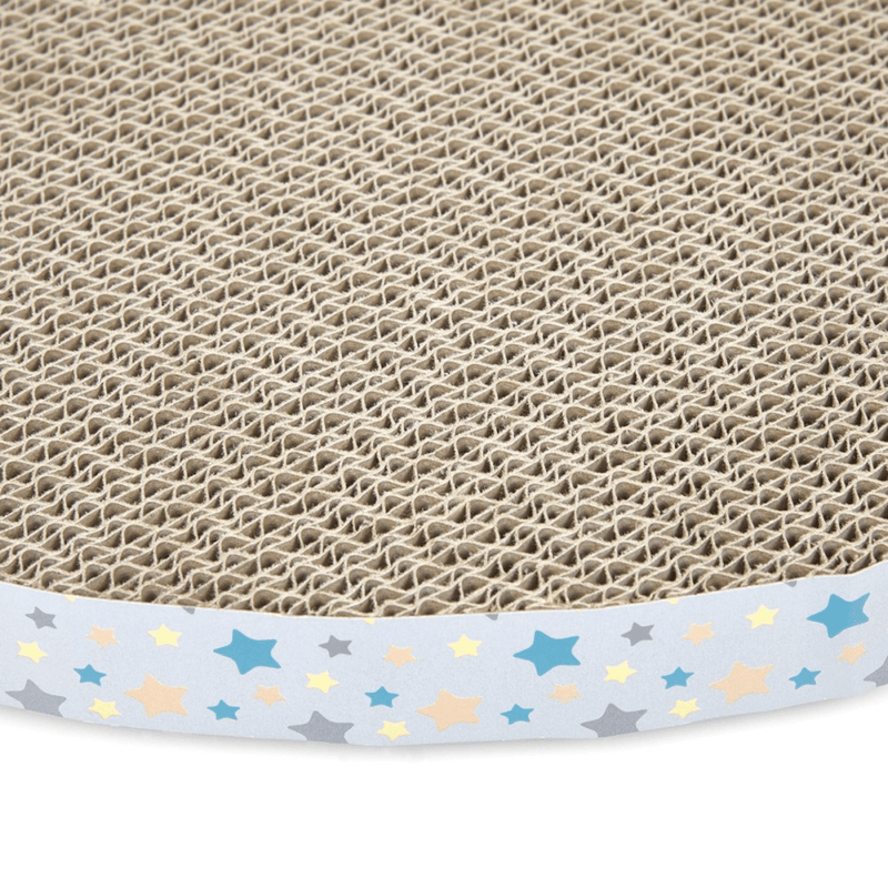 Close up of heart shaped corrugated cardboard scratcher with multicoloured star details around the outside on a white background. 