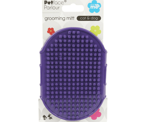 Purple rubber grooming mitt, packed on a cardboard sleeve on a white background. 